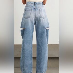 MAISON MARGIELA
Cutout high-rise wide-leg jeans 40
